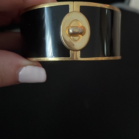 Beautiful Coach Wide Black and Gold Bangle with Turnlock Design. - Picture 3 of 6